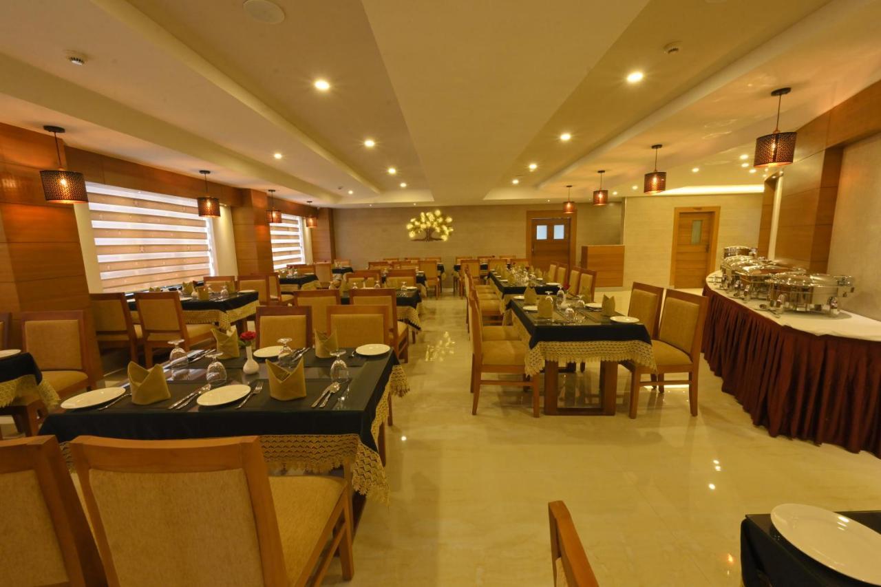Hotel Kabani International Muvattupuzha Exterior foto